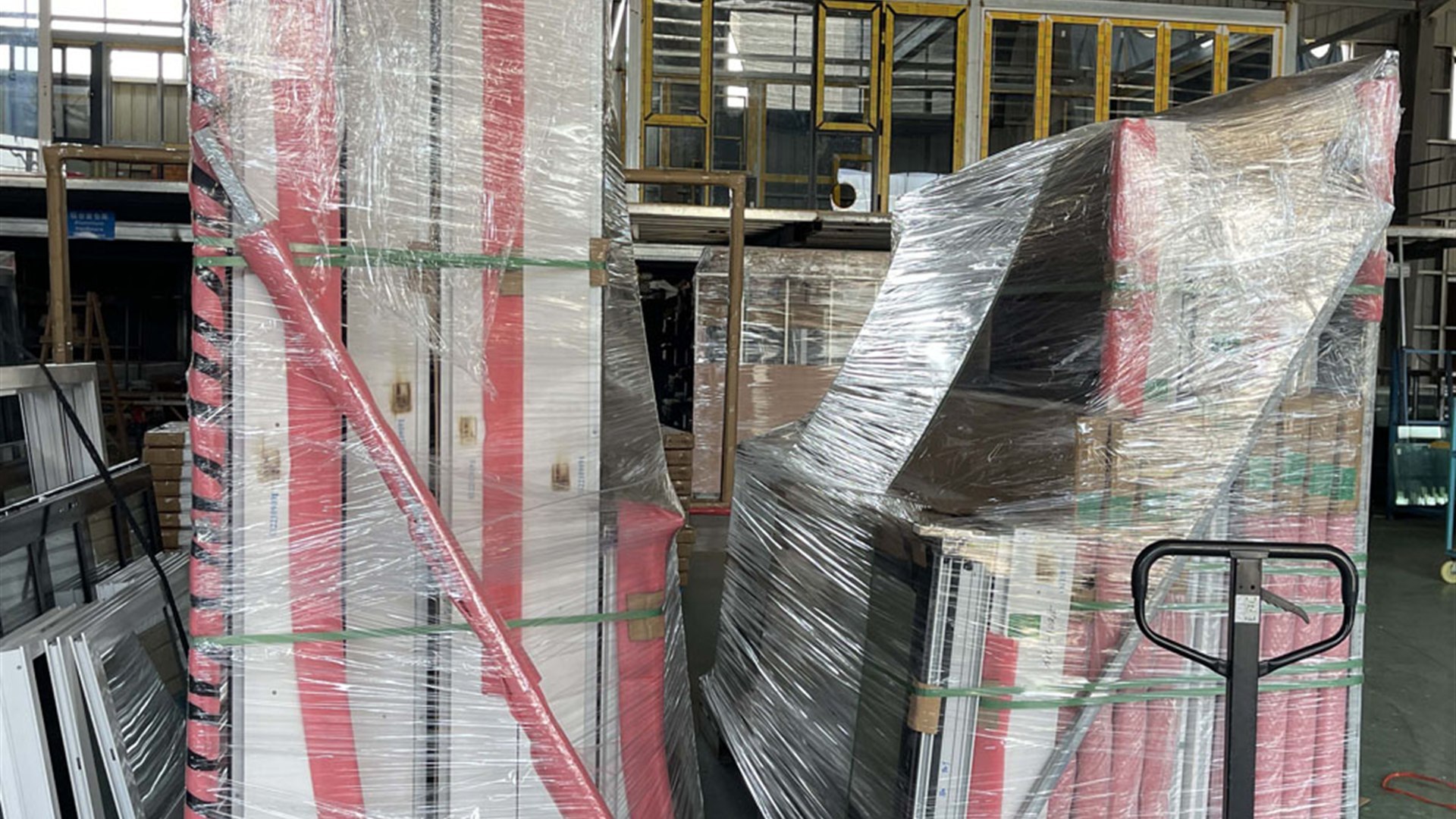 ROPO factory packing area with window and door frames protected before crating