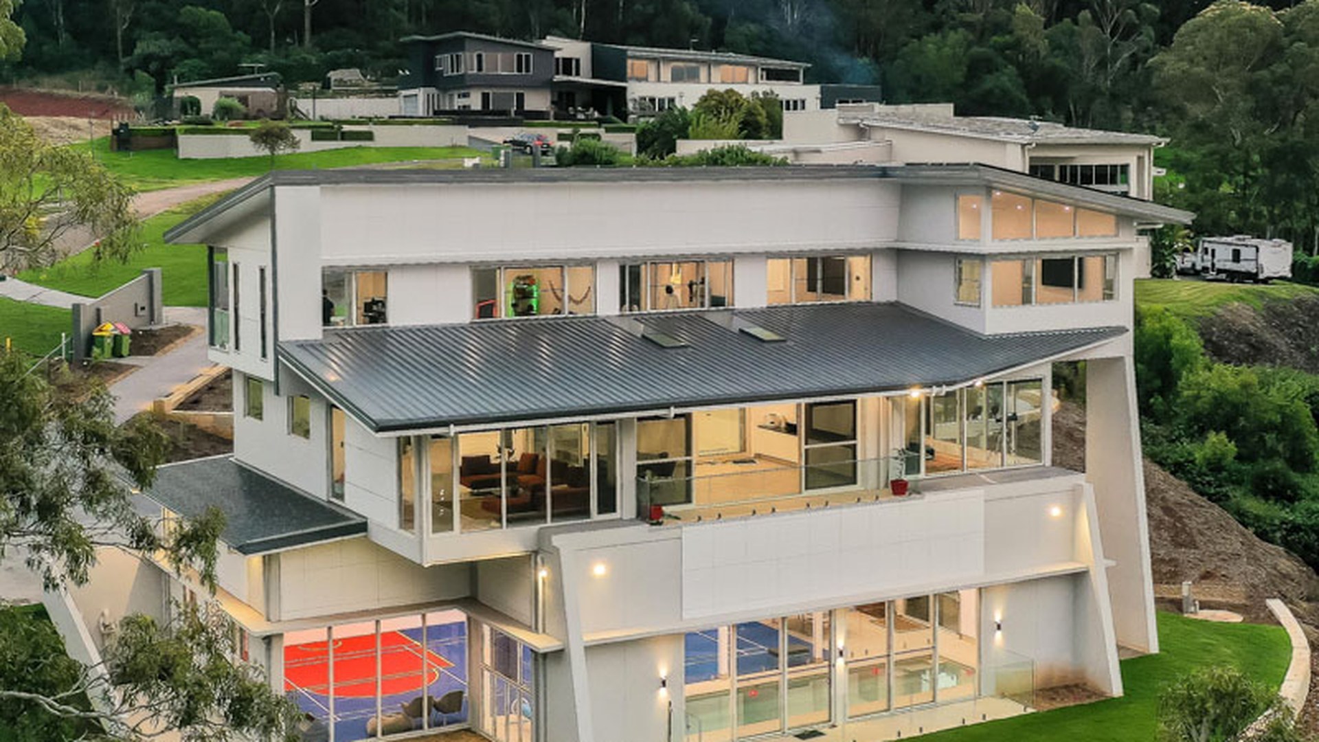 Ground-floor glazing on a completed project: the lower panes sit inside the human impact zone, which is where glass selection starts rather than where it ends.