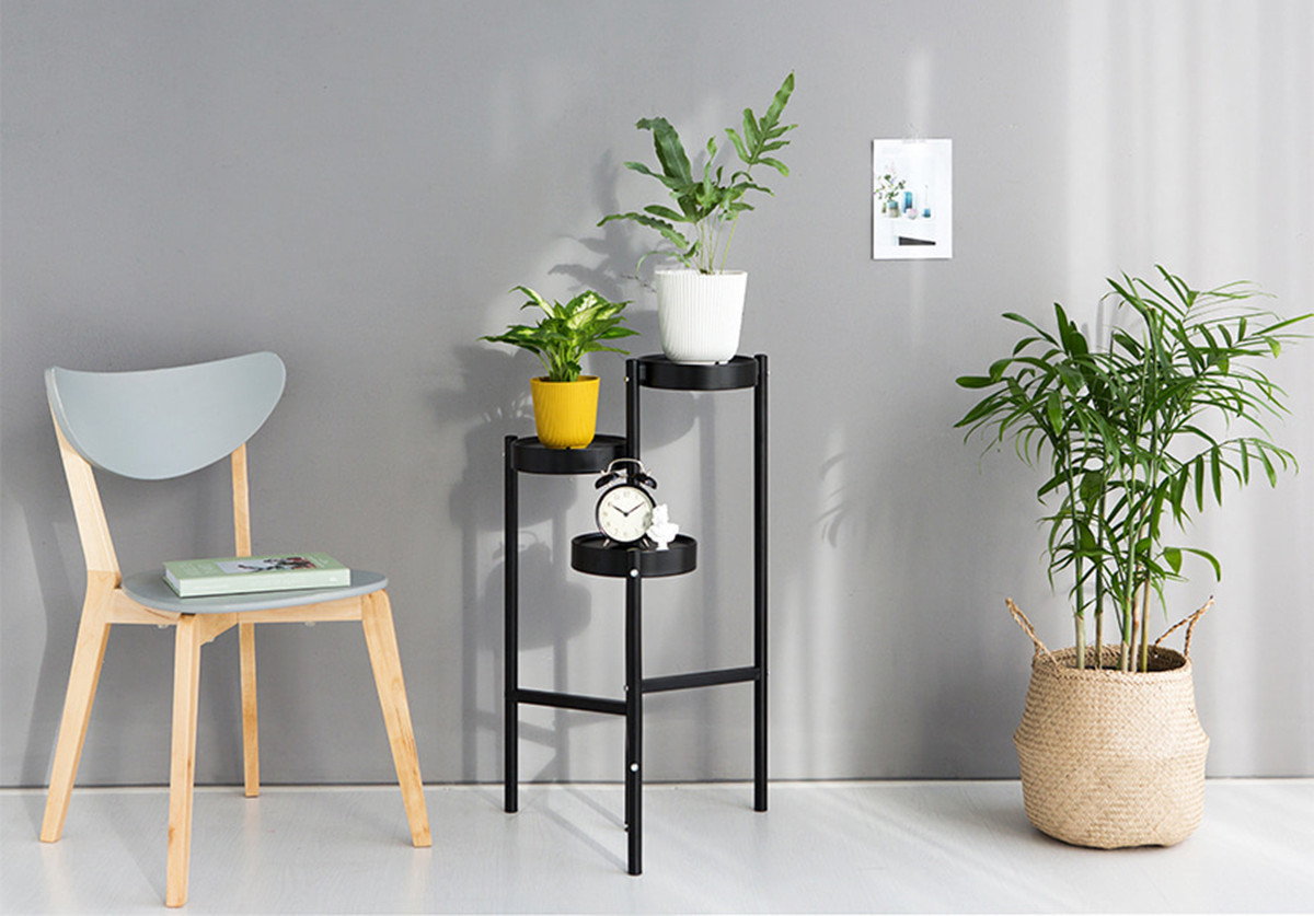 black metal plant stand 