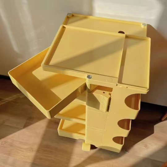 yellow plastic storage trolley