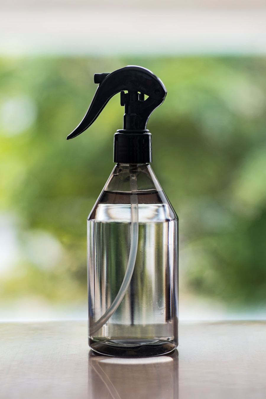 A spray bottle resting on a table with a soft blurred background