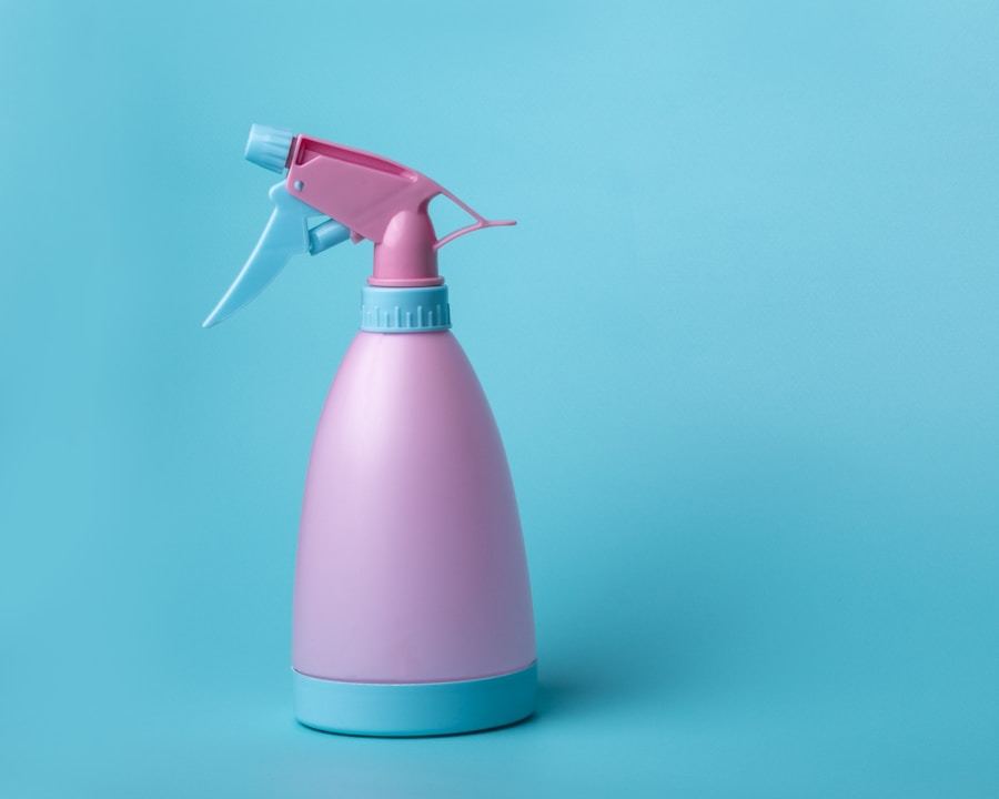 A pink and white fine mist spray bottle