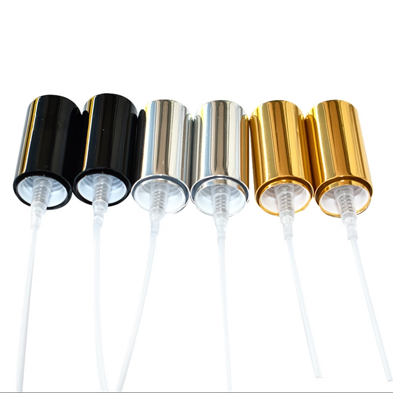 Screw-on aluminium perfume pumps in black, silver, and gold finishes with 60μL and 70μL output options