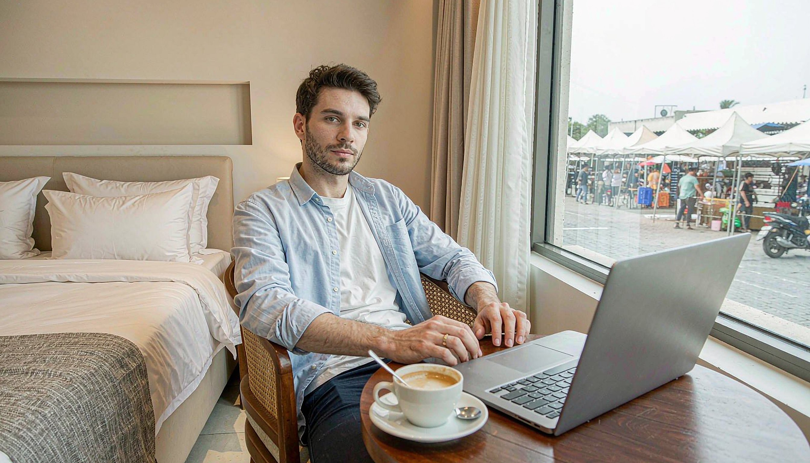 A comfortable hotel room near the market district