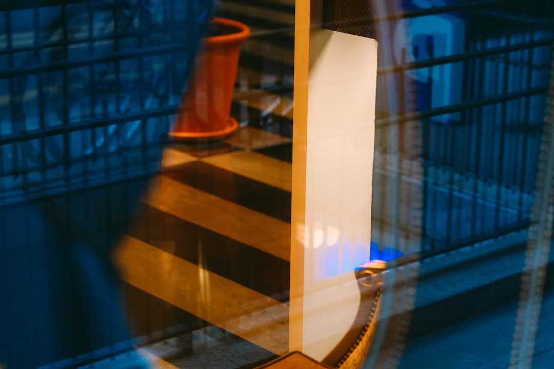 Close-up of a digital hygrometer display inside a wine cooler showing ideal humidity