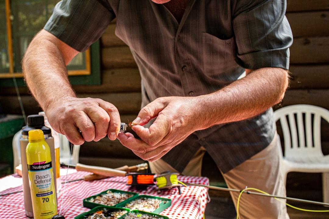 Craftsman inspecting a finished humidor