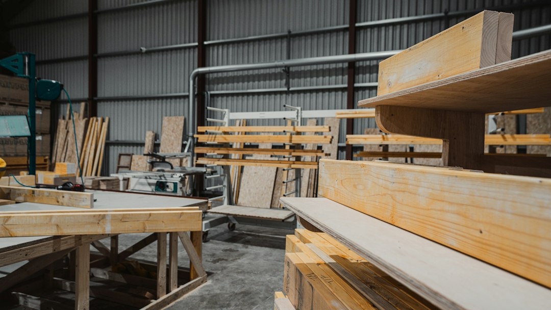 Stacks of certified, sustainably sourced Spanish Cedar in a factory warehouse.