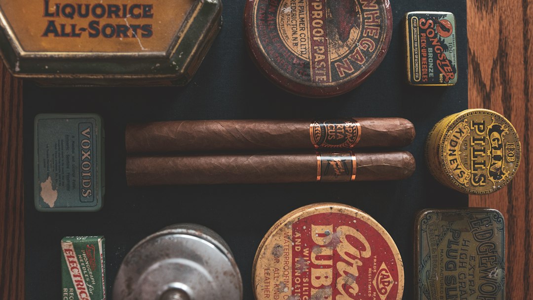 A collection of high-end wooden cigar humidors on display