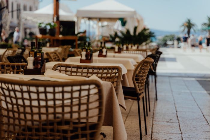 Elegant outdoor restaurant patio with weather-resistant furniture