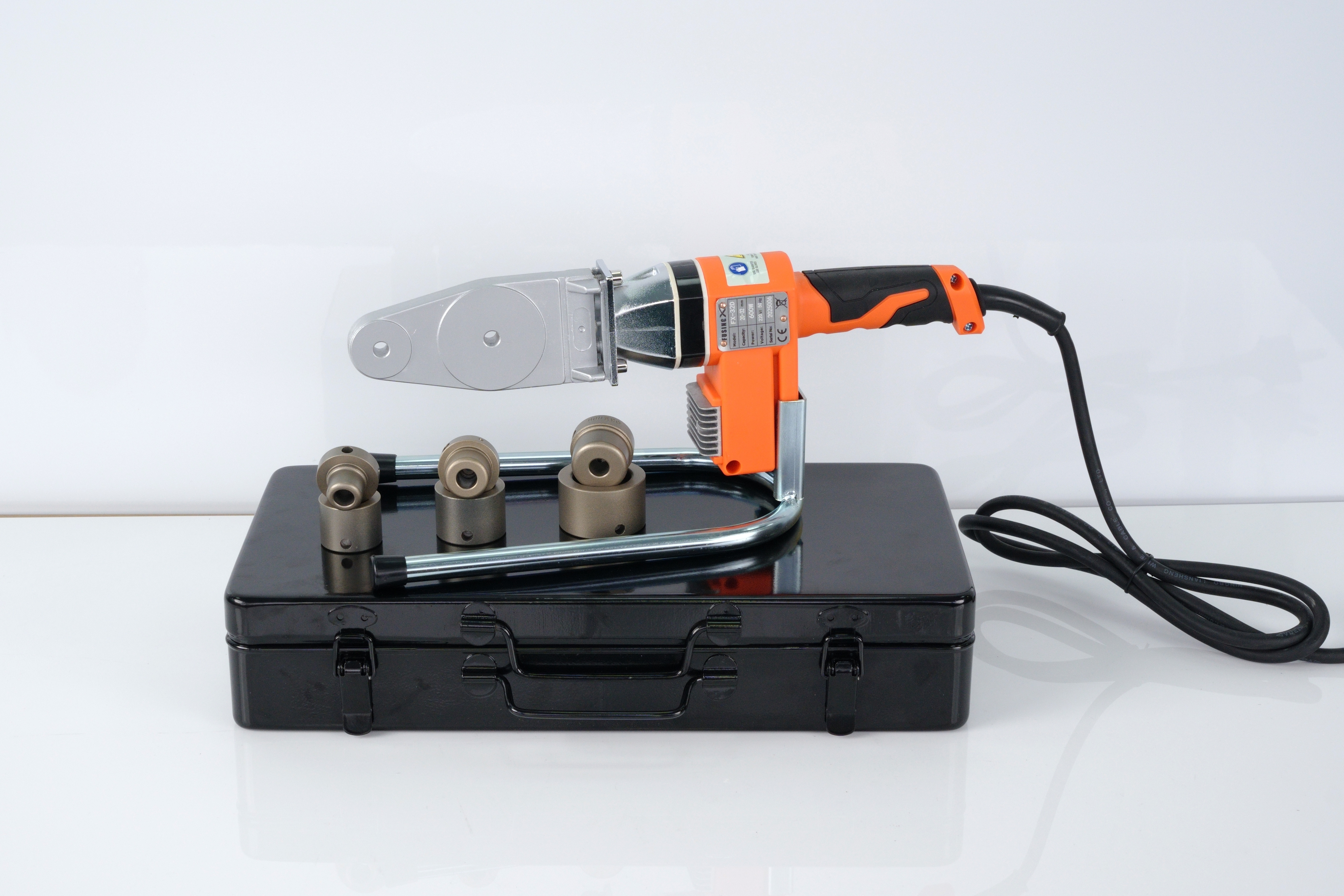 Hand-held socket fusion welder with heating sockets