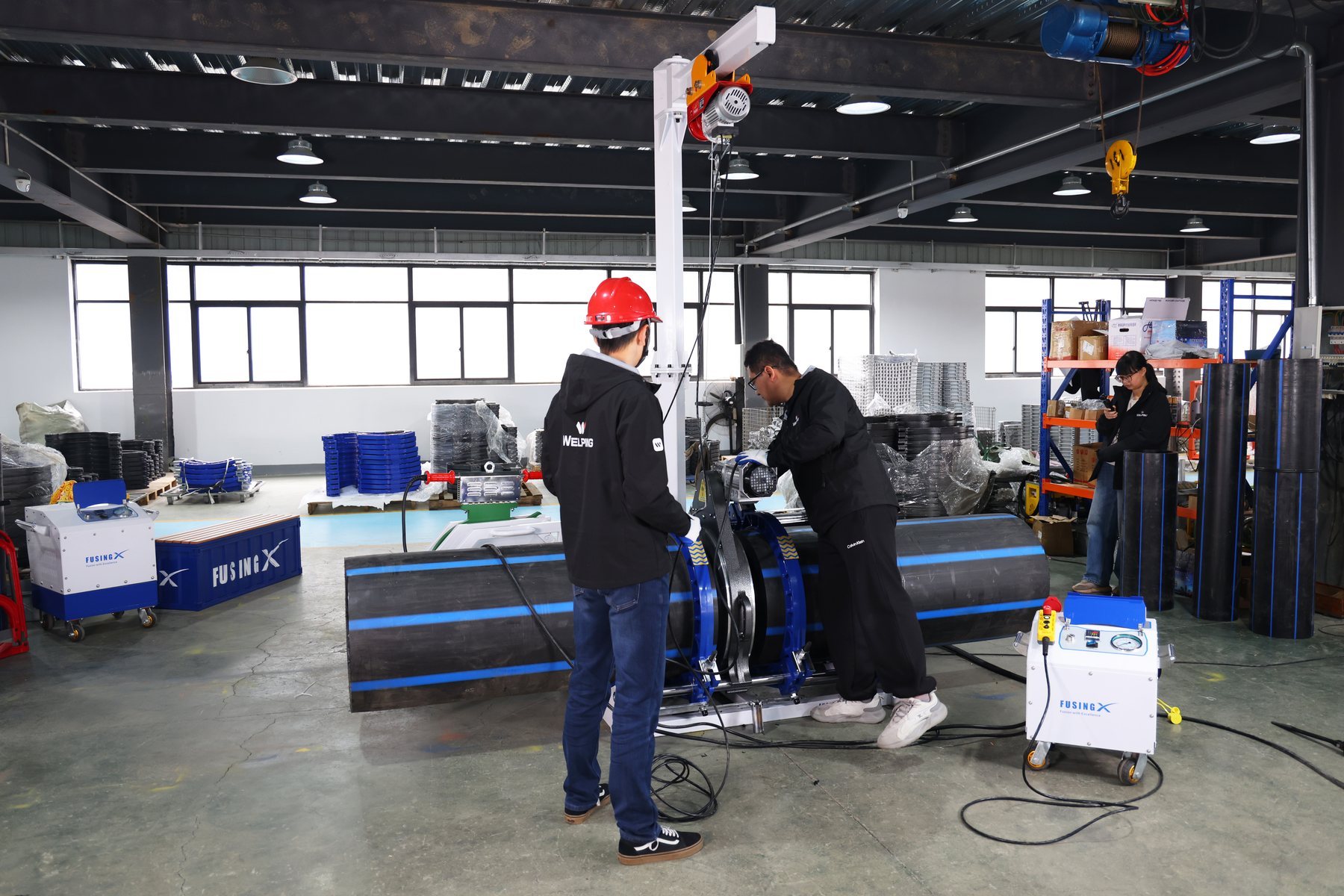 WELPING team commissioning PE pipe butt fusion equipment in the factory