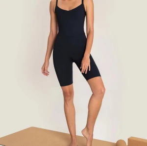 Custom high quality sexy compressive backless yoga jumpsuits one piece biker shorts sets