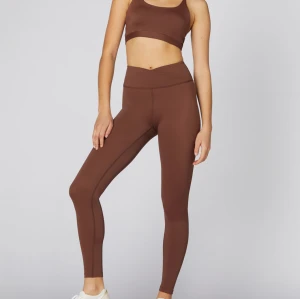 Custom crisscross waistband compressive ankle leggings women's nylon spandex fitness tights