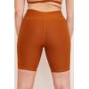 Plus size compressive yoga shorts for women with side pockets