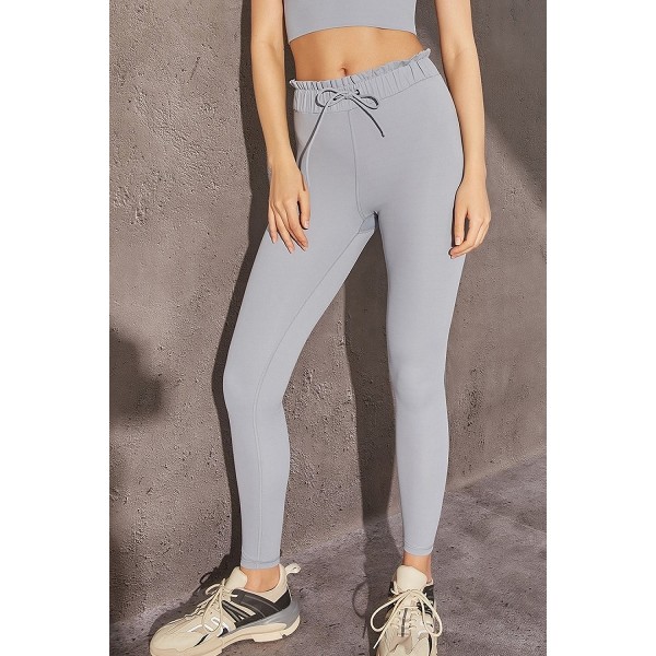 High-waisted women's yoga pants are made of four-way stretch fabric