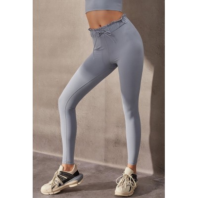 High-waisted women's yoga pants are made of four-way stretch fabric