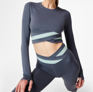 Women's yoga wear set classic round neck and long sleeves waist with visible wrap detail.