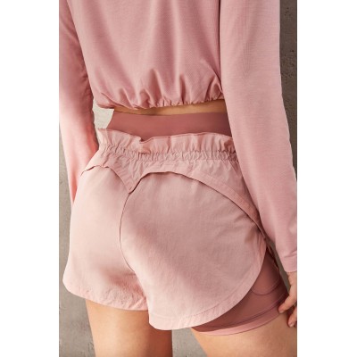 New women's sports shorts in pink with a petal look design