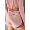 New women's sports shorts in pink with a petal look design