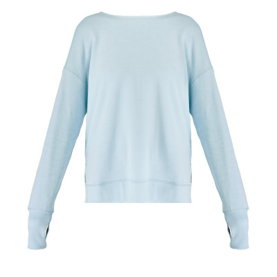 Women's sweatshirt has crossover back detail, side slits, and breathable sweat-wicking fabric.
