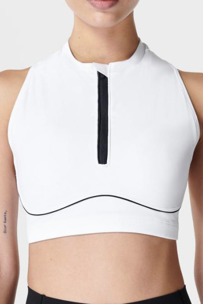This powerful shaping zipper sports bra provides elasticity, moisture-wicking, and quick-drying properties.