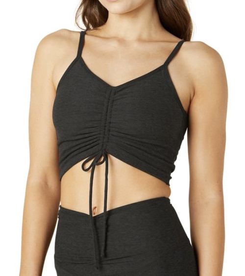 Yoga tank top has functional front chest wrinkles and an adjustable length that can be cut or extended to a long-line bra