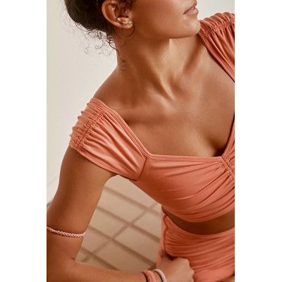 Designed for low-intensity exercise, breathable women's yoga tops