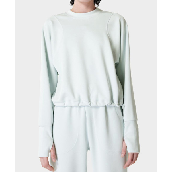 Women's crew neck sweatshirt with loose fit, elasticized hem and adjustable ties