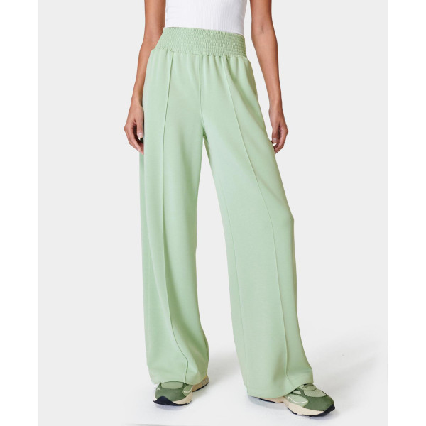 Women's high-waisted wide-leg track pant with pockets, soft fabrics