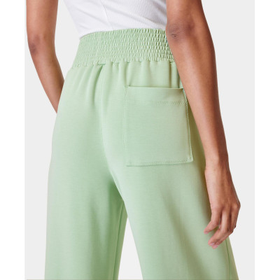 Women's high-waisted wide-leg track pant with pockets, soft fabrics
