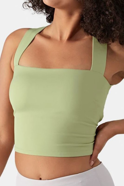 Women's yoga tank top is made of breathable fabric, soft to the touch, moisture wicking, with strappy and waist-cinching design