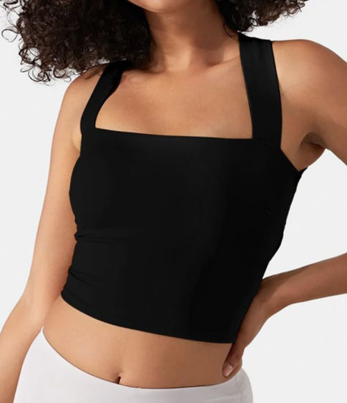 Women's yoga tank top is made of breathable fabric, soft to the touch, moisture wicking, with strappy and waist-cinching design
