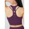 Women's Bra Tank Top is perfect for layering. It's made from a lightweight, shapely knit fabric with a 2-in-1 illusion effect and adjustable double straps that crisscross at the back