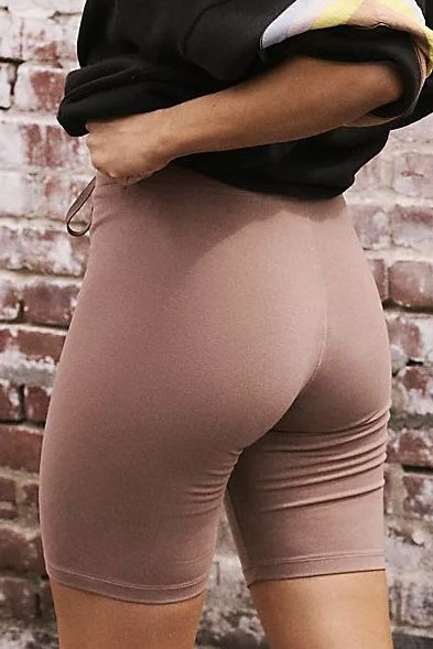 Women's cycling shorts with a high-waisted, flattering fit, made of soft cotton spandex fabric with a stretchy feel, wide elastic waistband with adjustable drawstring