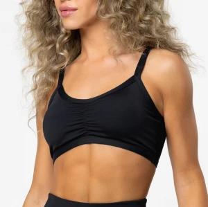 Crew neck medium support ruched sports bra with spaghetti straps
