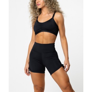 Crew neck medium support ruched sports bra with spaghetti straps