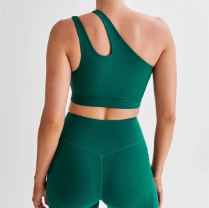 One shoulder asymetic padded sports bra for ladies supportive fitness bra