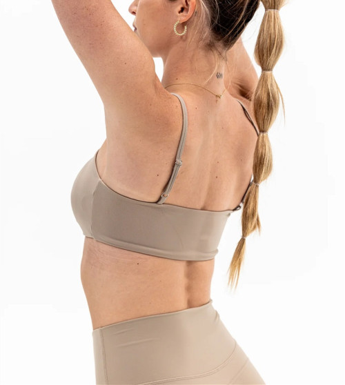 Moisture-wicking nylon spandex ruched tube top with removable paddings