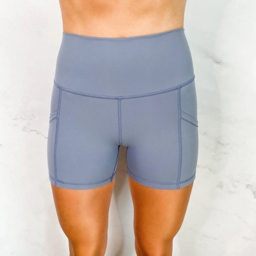 High waisted solid color biker shorts with pockets butt lifting yoga shorts