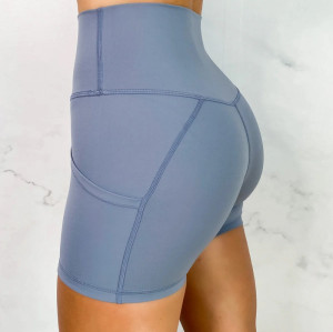 High waisted solid color biker shorts with pockets butt lifting yoga shorts