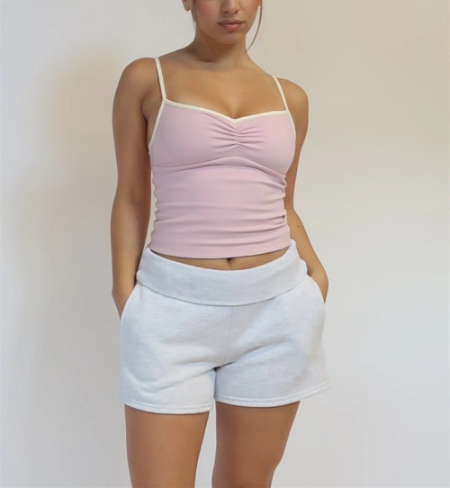 Women's athleisure style padded ruched yoga crop top with spaghetti straps