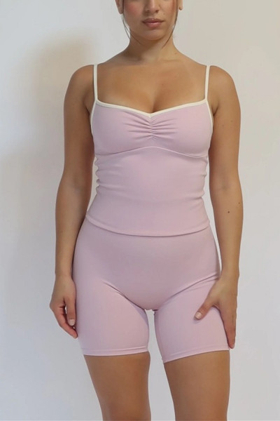 Women's athleisure style padded ruched yoga crop top with spaghetti straps