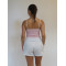 Women's athleisure style padded ruched yoga crop top with spaghetti straps