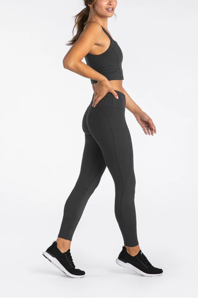 Tummy control compressive fitness tights with side pockets
