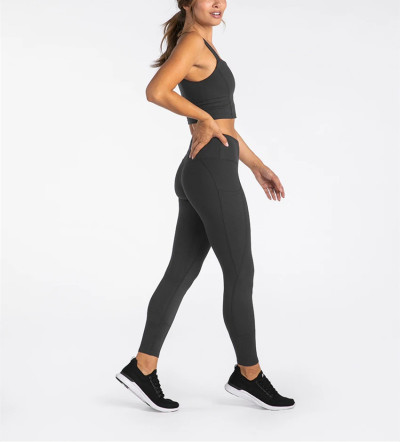 Tummy control compressive fitness tights with side pockets