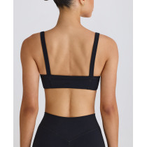 Scoop neck padded sports bra with wide shoulder straps medium impact lower back yoga bralette