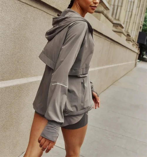 Women's breathable training jackets with reflective bars