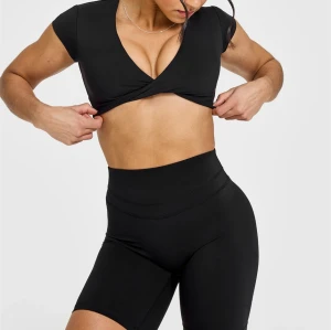 Heart neckline twist front short sleeve tees cut out back sports t shirts