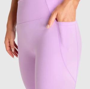 Tummy control flattering butt lifting yoga leggings with side pockets nylon spandex full length tights