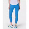 Women's mid rise compressive gym leggings with side pockets